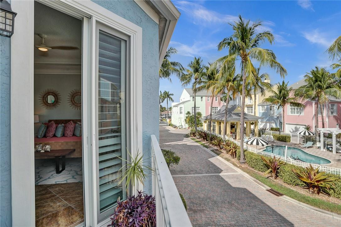2820 Marina Circle Lighthouse Point, FL 33064 - Photo 25 of 37 a view of a balcony with potted plants