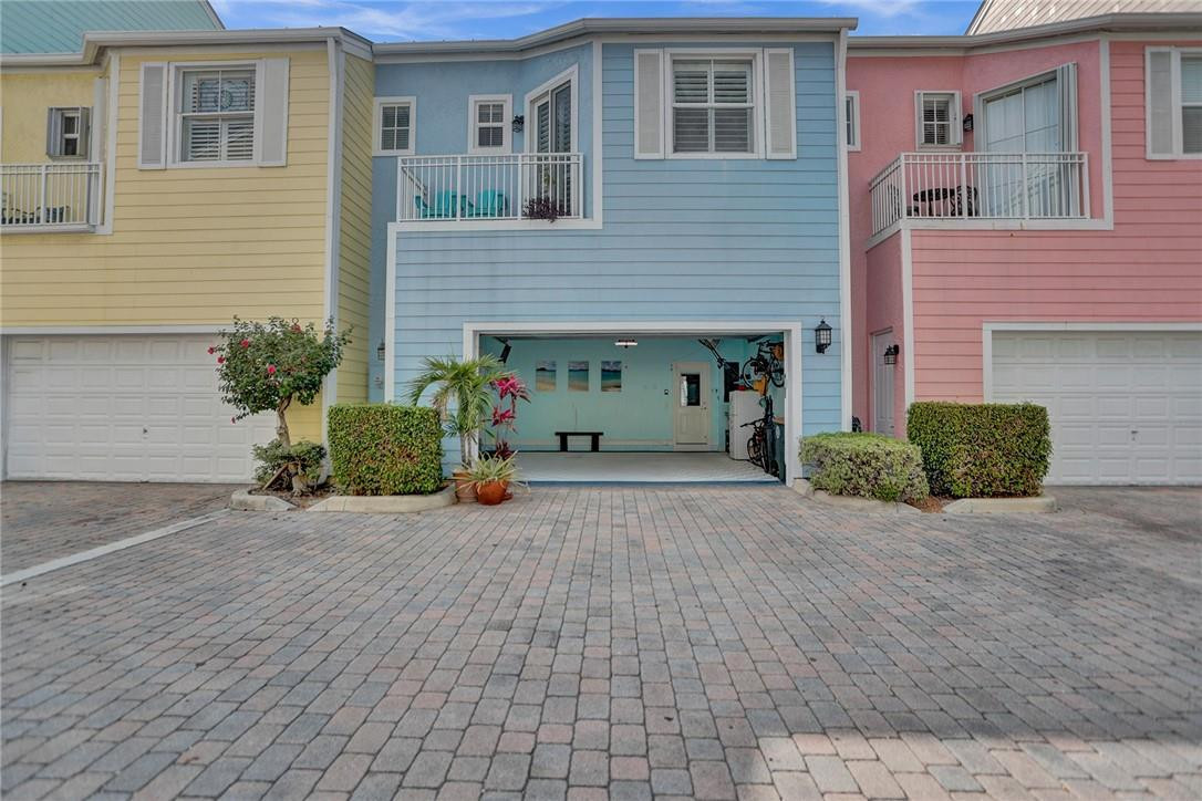 2820 Marina Circle Lighthouse Point, FL 33064 - Photo 27 of 37 a view of a house with a yard and garage