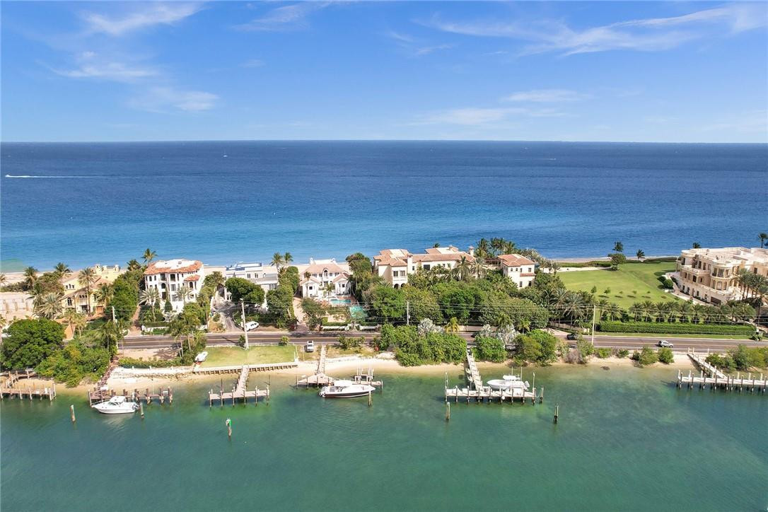 2820 Marina Circle Lighthouse Point, FL 33064 - Photo 34 of 37 a view of a lake with lawn chairs