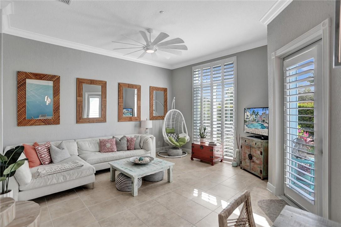 2820 Marina Circle Lighthouse Point, FL 33064 - Photo 5 of 37 a living room with furniture and a window