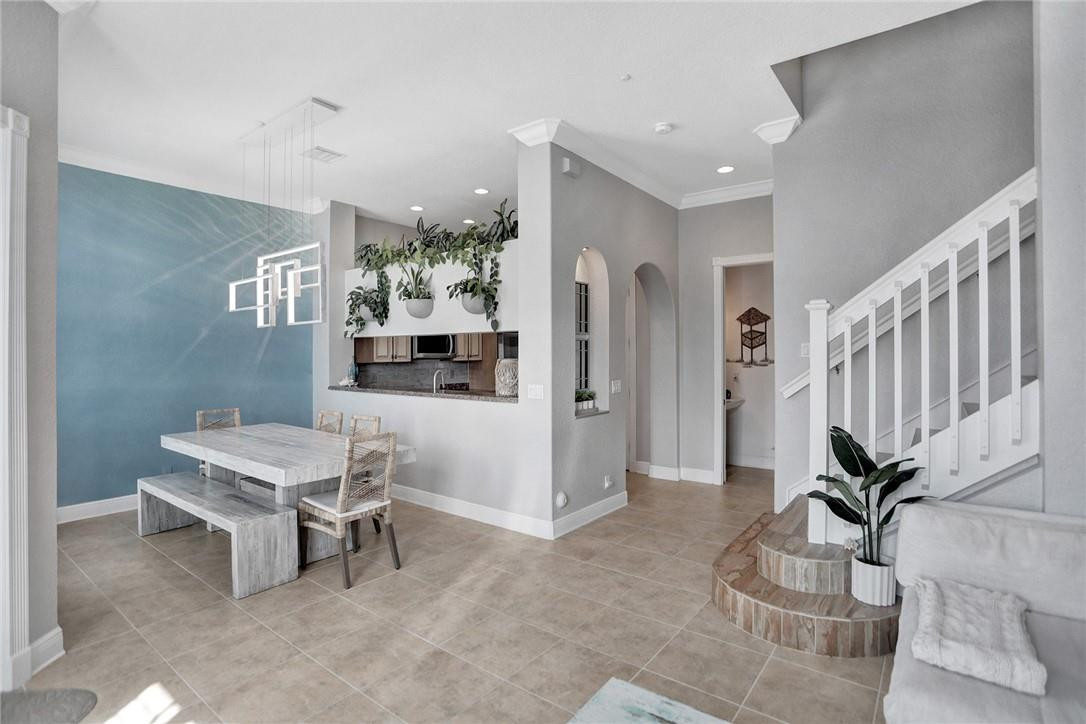 2820 Marina Circle Lighthouse Point, FL 33064 - Photo 6 of 37 a living room with furniture and a potted plant