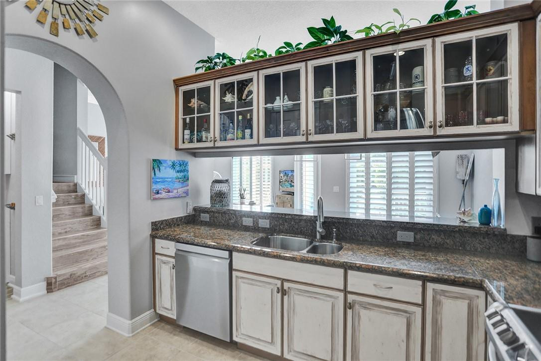 2820 Marina Circle Lighthouse Point, FL 33064 - Photo 7 of 37 a kitchen with stainless steel appliances granite countertop a sink and a granite counter tops