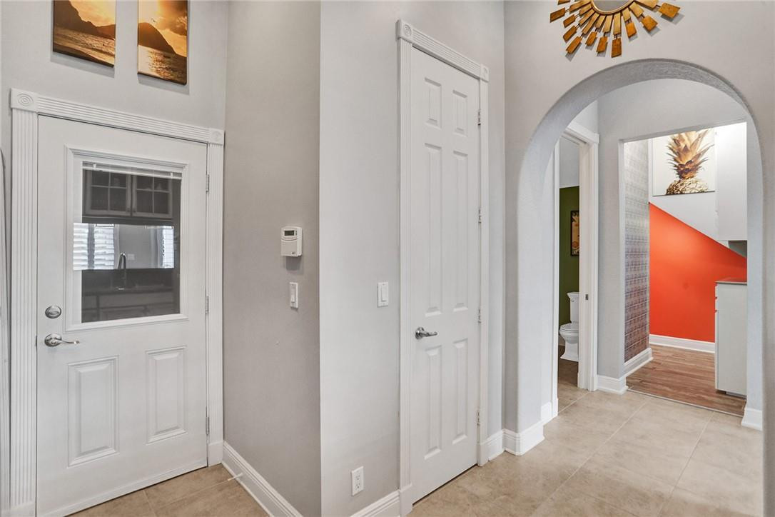 2820 Marina Circle Lighthouse Point, FL 33064 - Photo 10 of 37 a view of an entryway with a hallway
