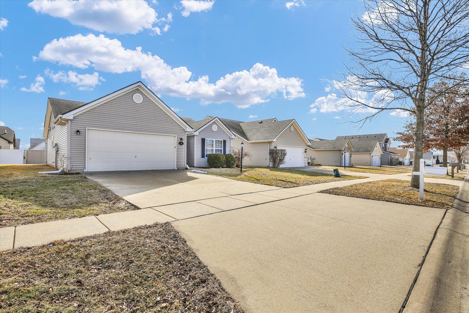 501 Luria Lane Champaign, IL 61822 - Photo 1 of 33 a house with trees in the background