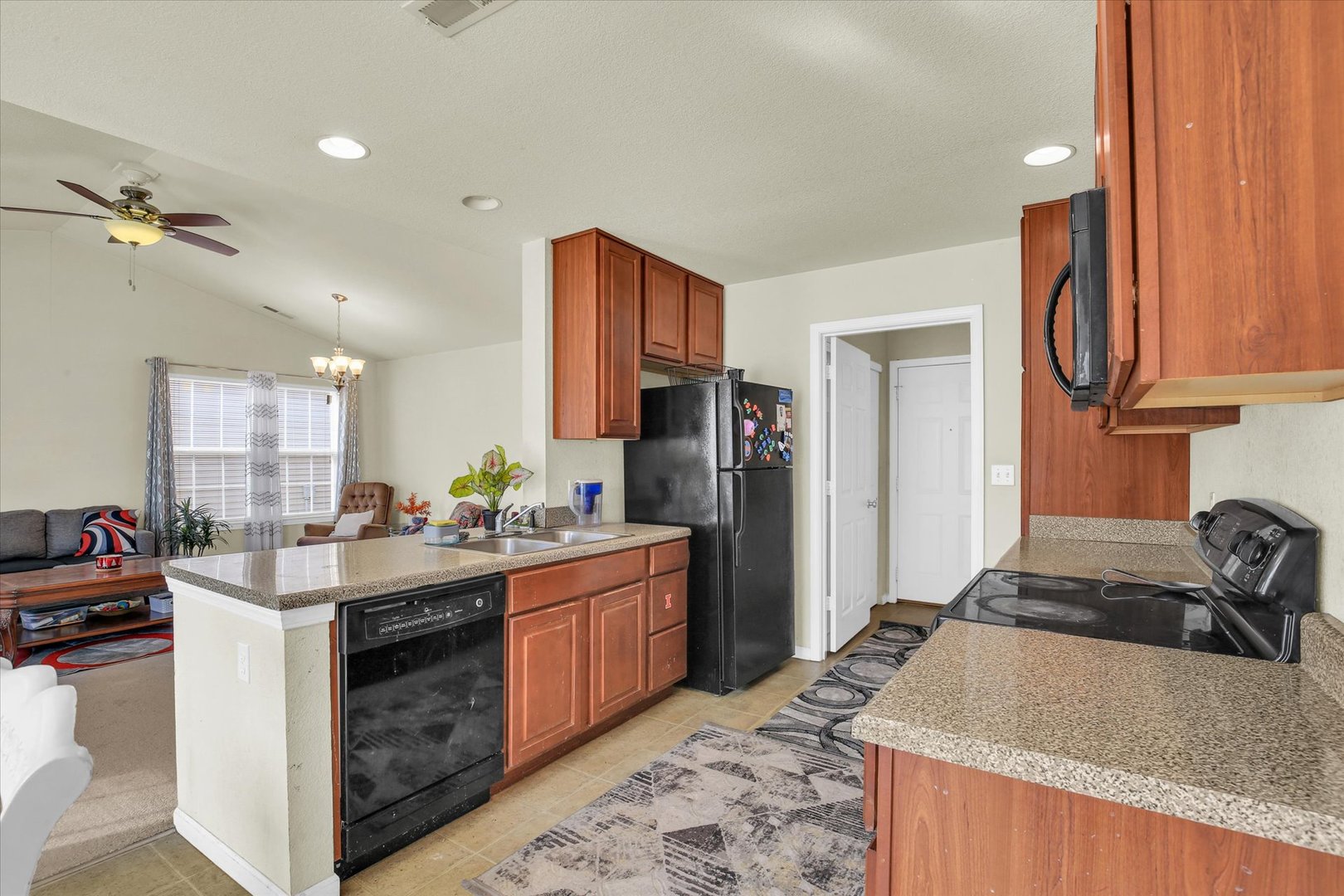 501 Luria Lane Champaign, IL 61822 - Photo 15 of 33 a kitchen with a sink stove and refrigerator