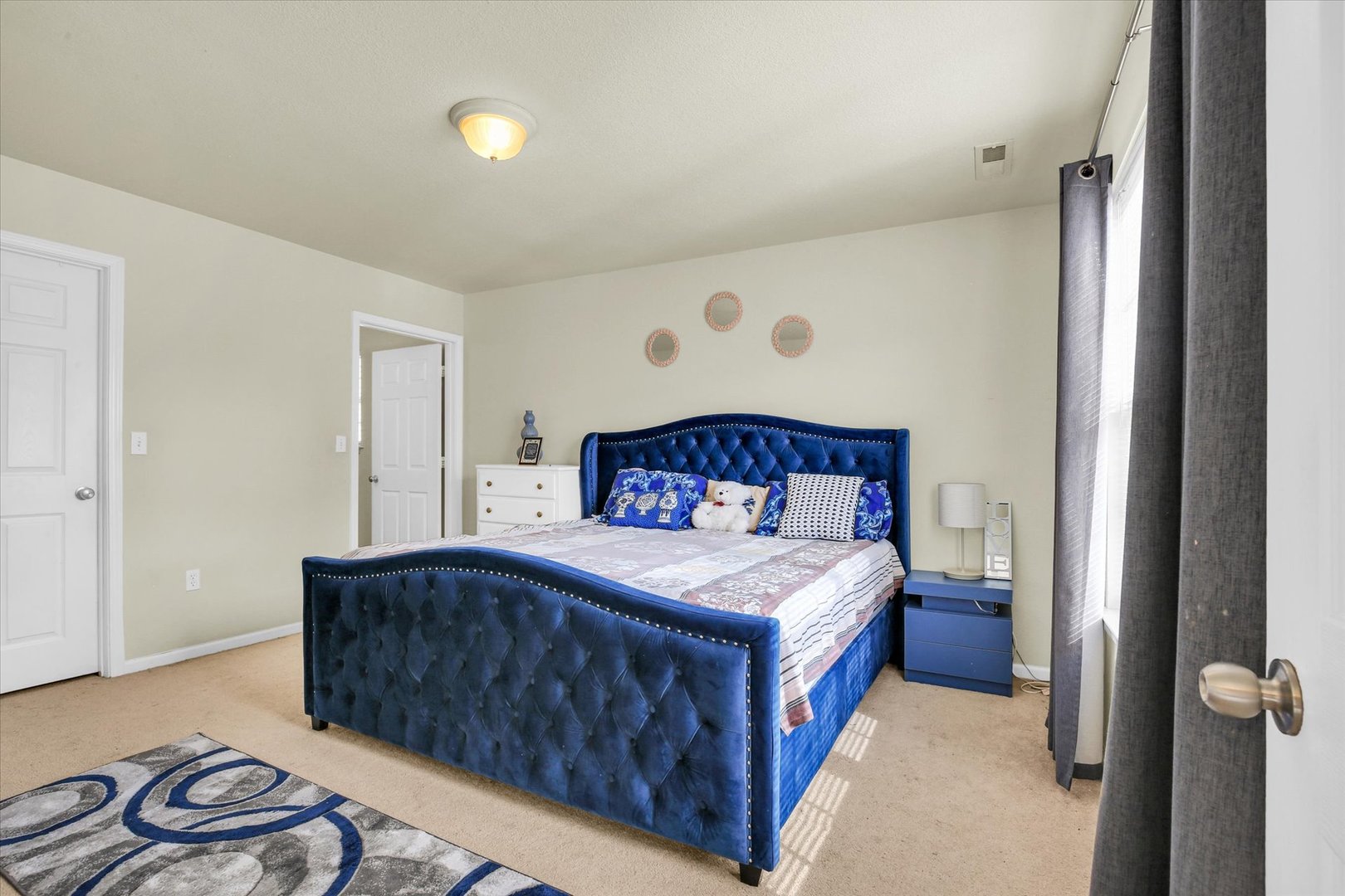 501 Luria Lane Champaign, IL 61822 - Photo 20 of 33 a bedroom with a bed and a painting on the wall