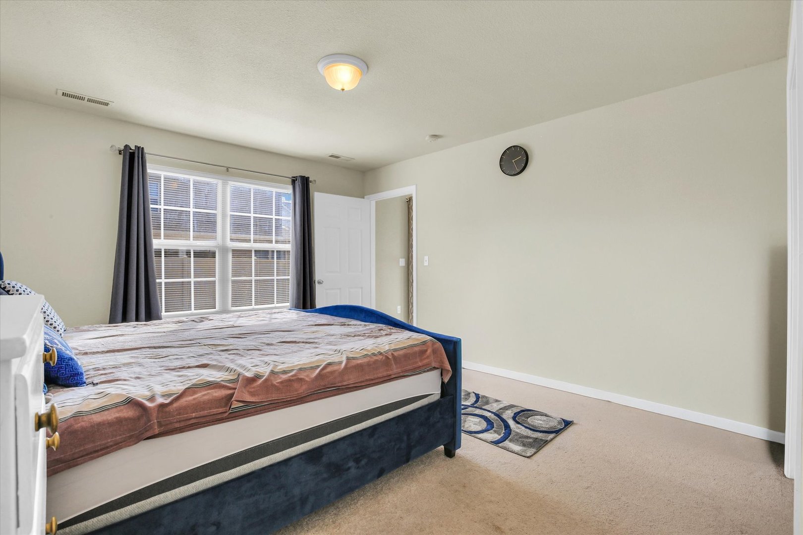 501 Luria Lane Champaign, IL 61822 - Photo 21 of 33 a bedroom with a bed and window