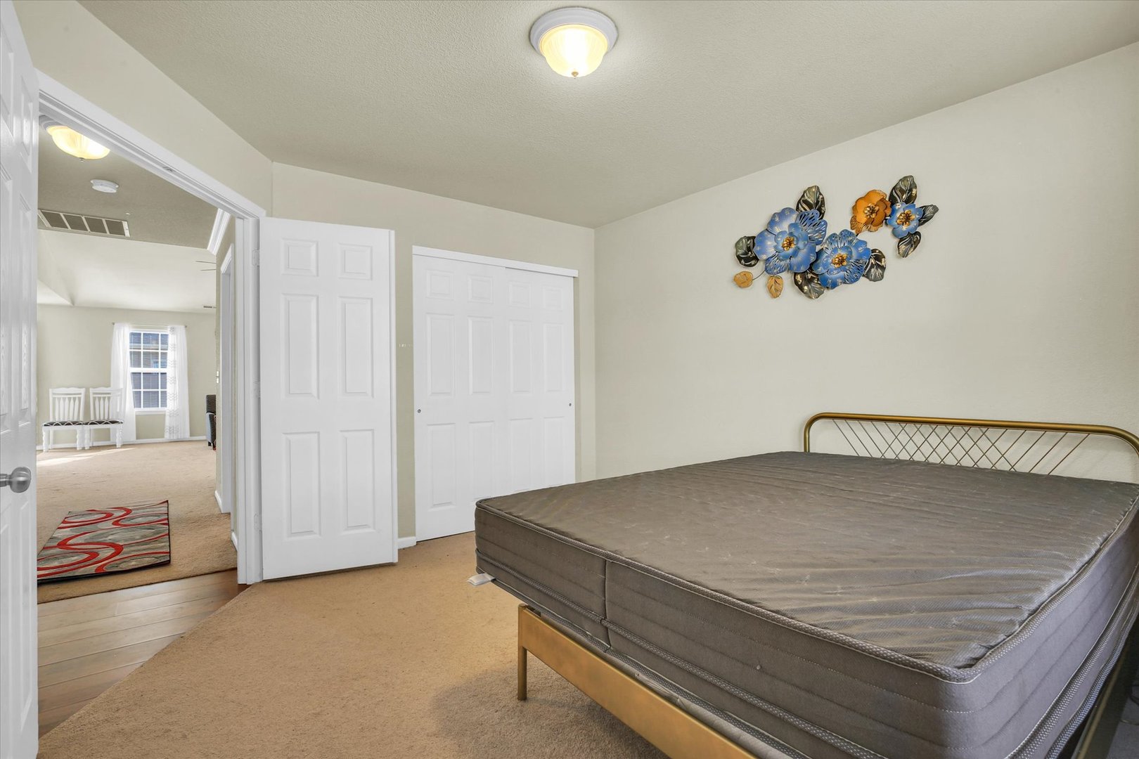 501 Luria Lane Champaign, IL 61822 - Photo 24 of 33 a bedroom with a bed and a painting on the wall
