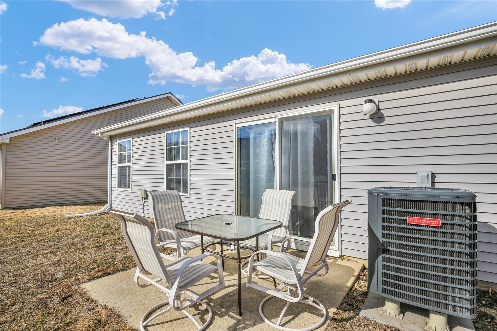 501 Luria Lane Champaign, IL 61822 - Photo 26 of 33 a view of a patio with table and chairs and potted plants