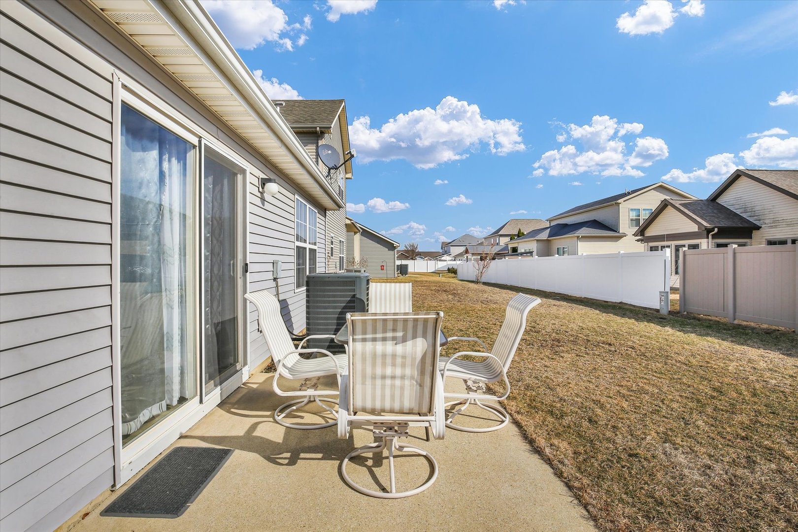 501 Luria Lane Champaign, IL 61822 - Photo 27 of 33 a view of a patio with table and chairs