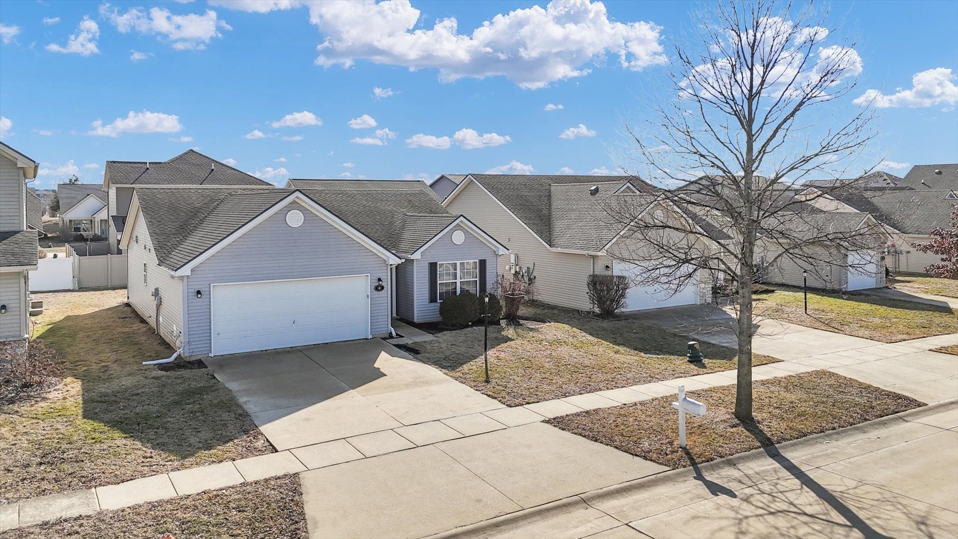 501 Luria Lane Champaign, IL 61822 - Photo 31 of 33 a view of a house with a yard