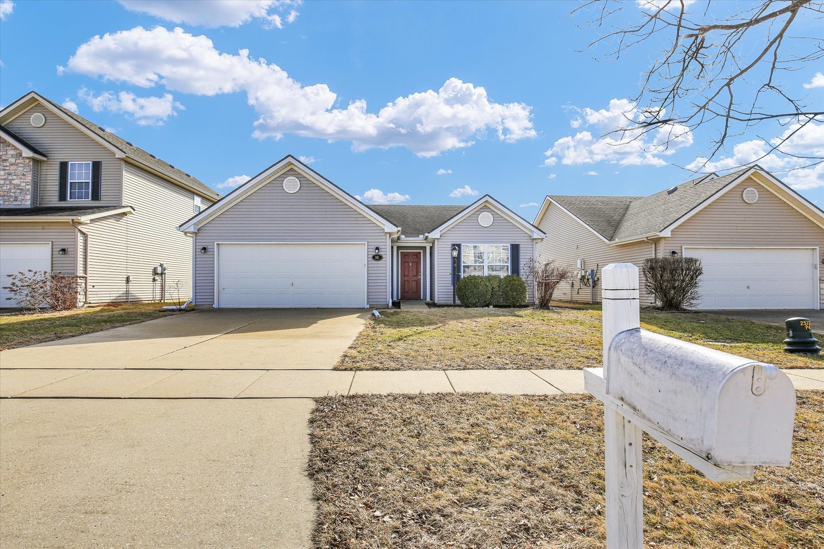 501 Luria Lane Champaign, IL 61822 - Photo 4 of 33 a house view with a garden space