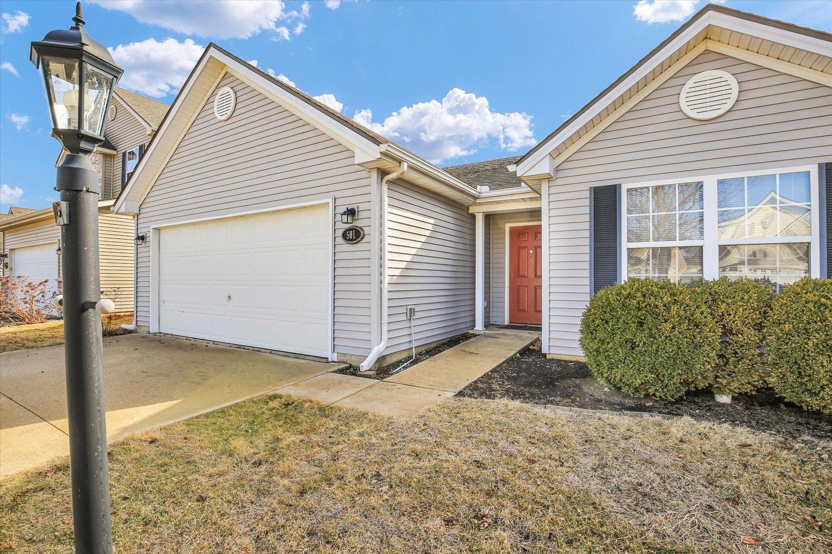 501 Luria Lane Champaign, IL 61822 - Photo 5 of 33 a view of a house with a backyard