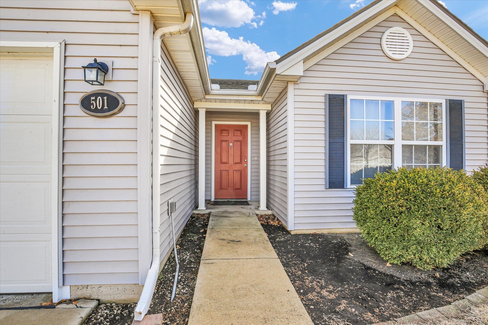 501 Luria Lane Champaign, IL 61822 - Photo 6 of 33 a view of a house with a door and a window