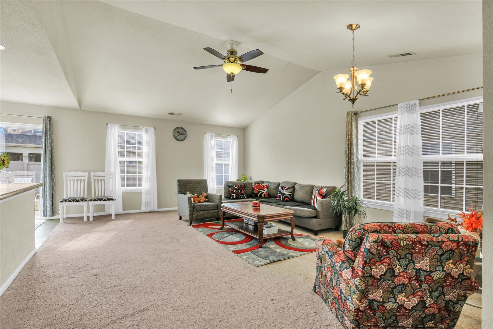 501 Luria Lane Champaign, IL 61822 - Photo 9 of 33 a living room with furniture chandelier and a chandelier