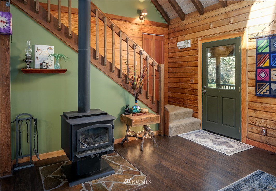 230 Eliza Road Lopez Island, WA 98261 - Photo 4 of 26 a view of entryway livingroom and hall with wooden floor