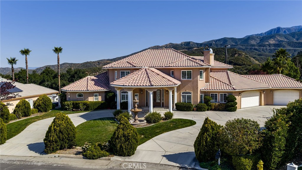 38136 Butterfly Court Yucaipa, CA 92399 - Photo 8 of 71 a front view of a house with a garden