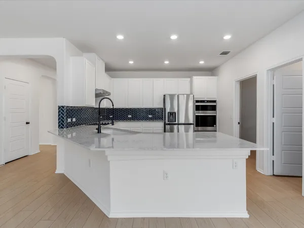 a view of kitchen with stainless steel appliances