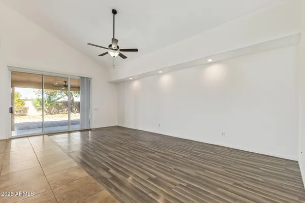 a kitchen with granite countertop a stove a sink and a granite counter tops