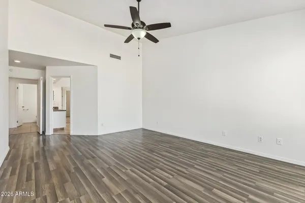 a spacious bathroom with a tub and a shower