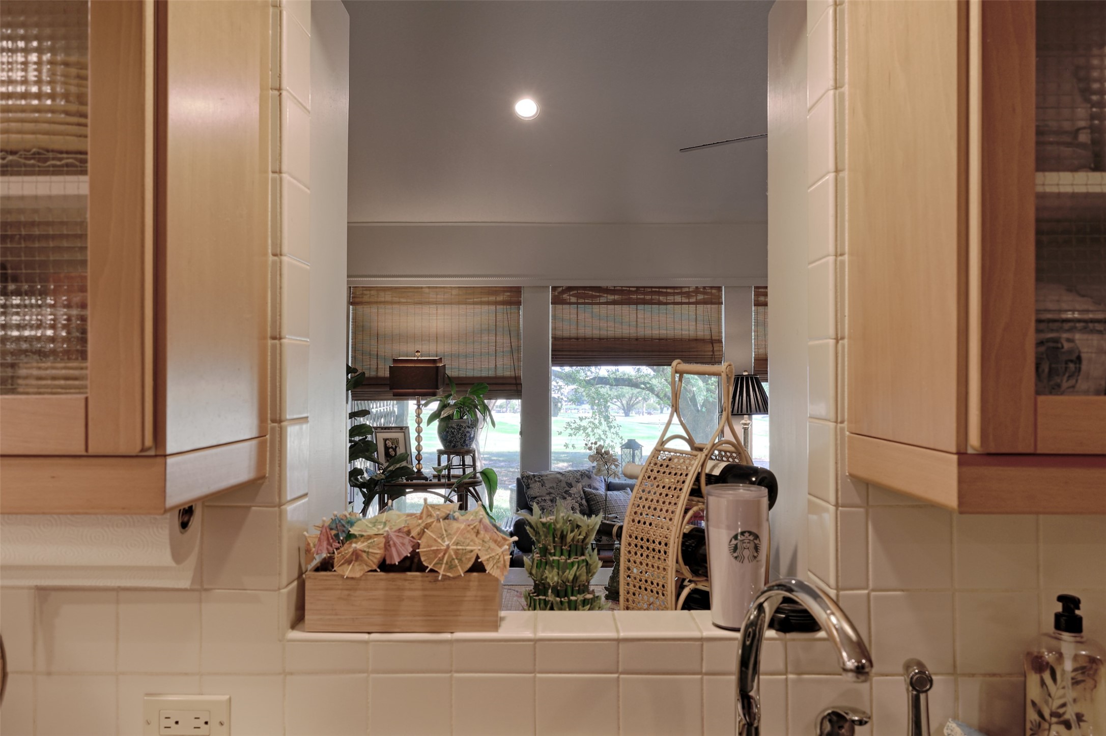 34 April Hill Conroe, TX 77356 - Photo 11 of 33 Above the sink is a pass through window to the family room.