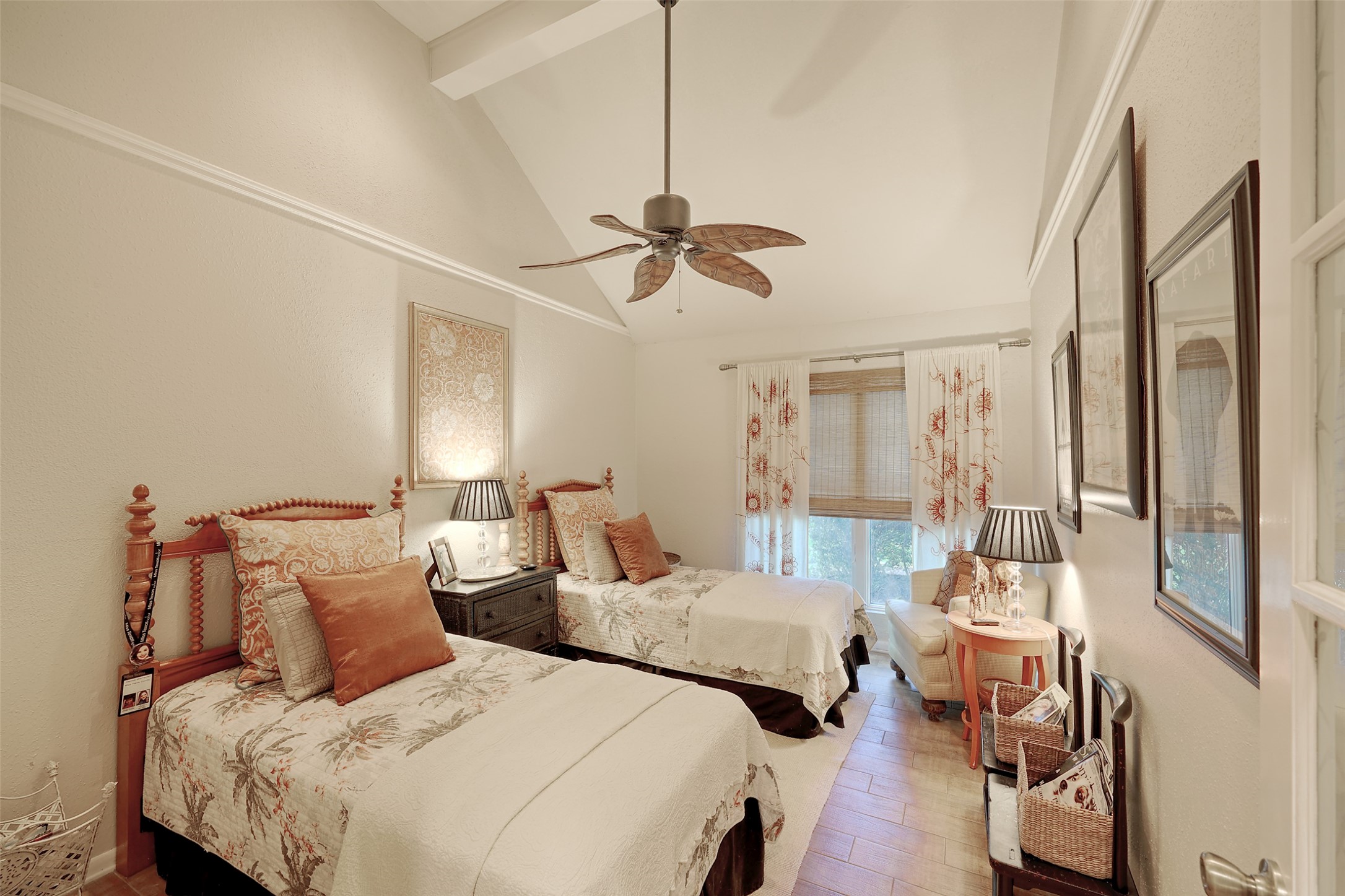 34 April Hill Conroe, TX 77356 - Photo 19 of 33 The vaulted ceiling in this room with beam also adds to the airy feel.