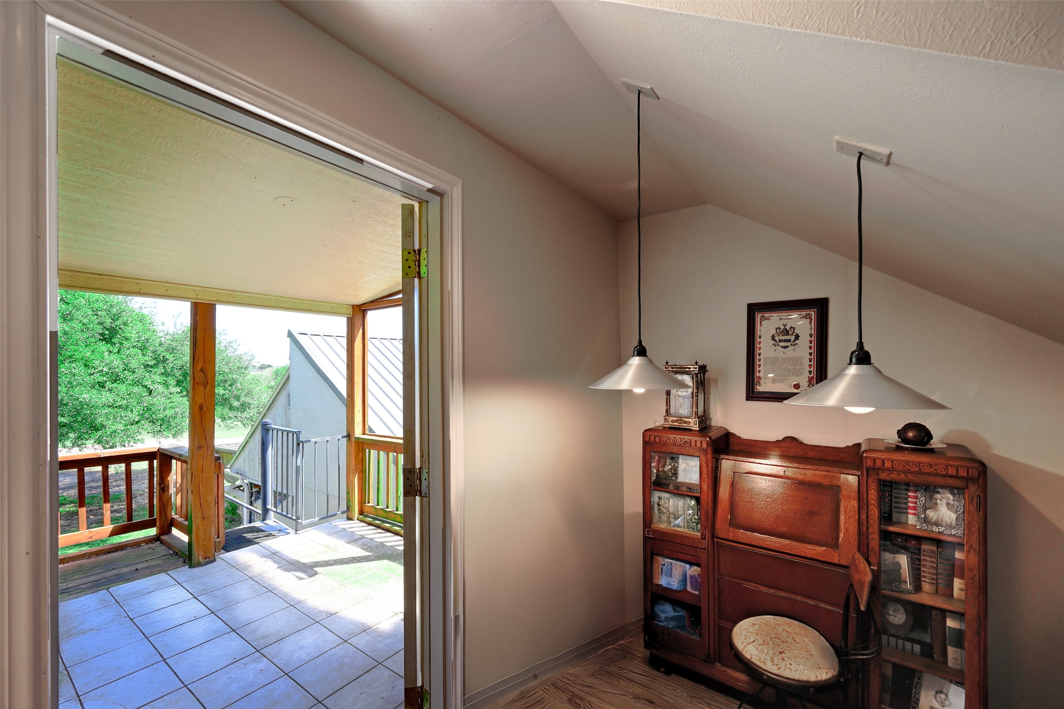 34 April Hill Conroe, TX 77356 - Photo 27 of 33 A view of the second floor deck outside of the extra space.