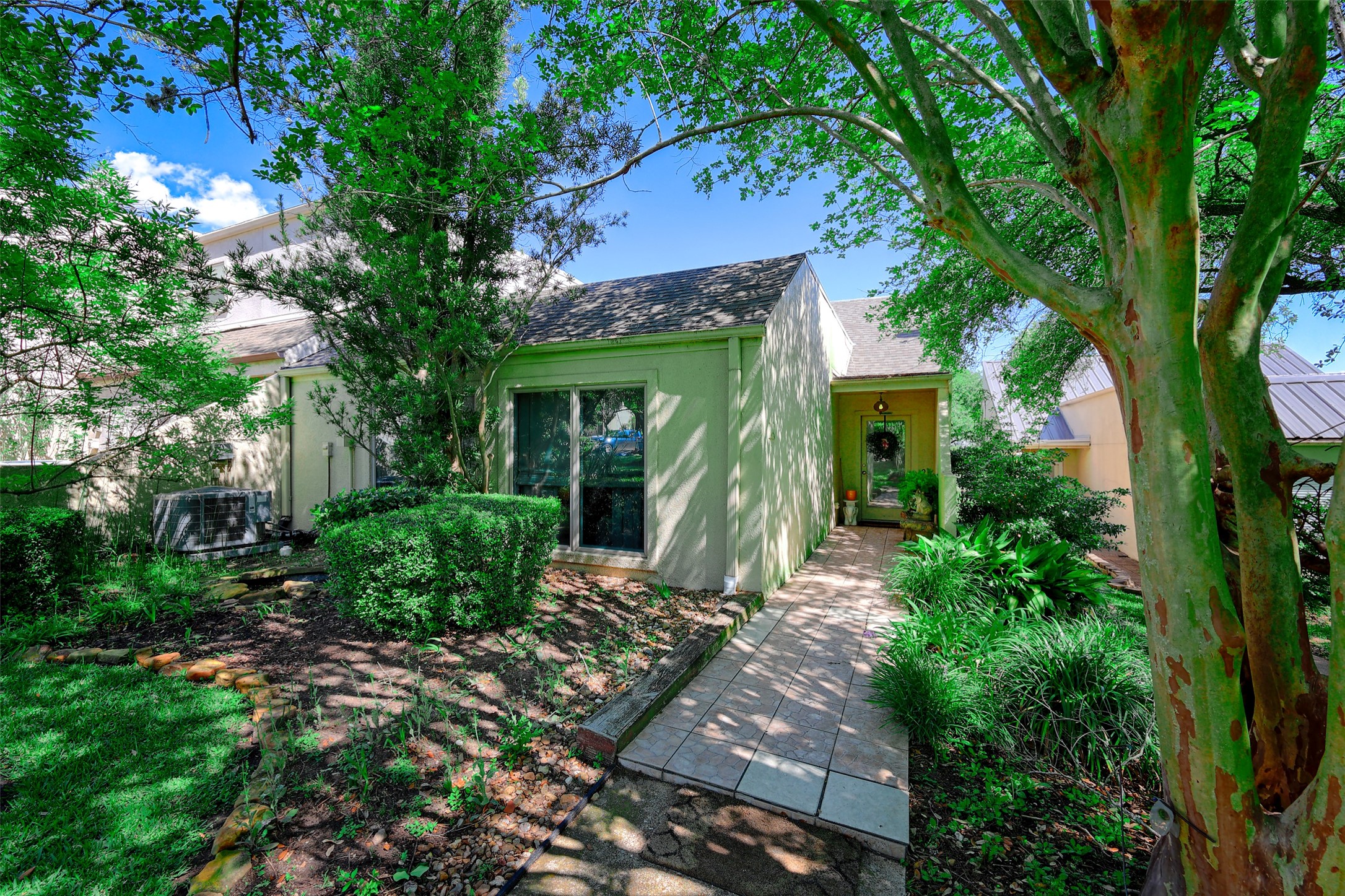 34 April Hill Conroe, TX 77356 - Photo 3 of 33 Welcome to this charming home in the gated community of April Sound. Located on the golf course with views of Lake Conroe, this home offers a serene setting for comfortable living.