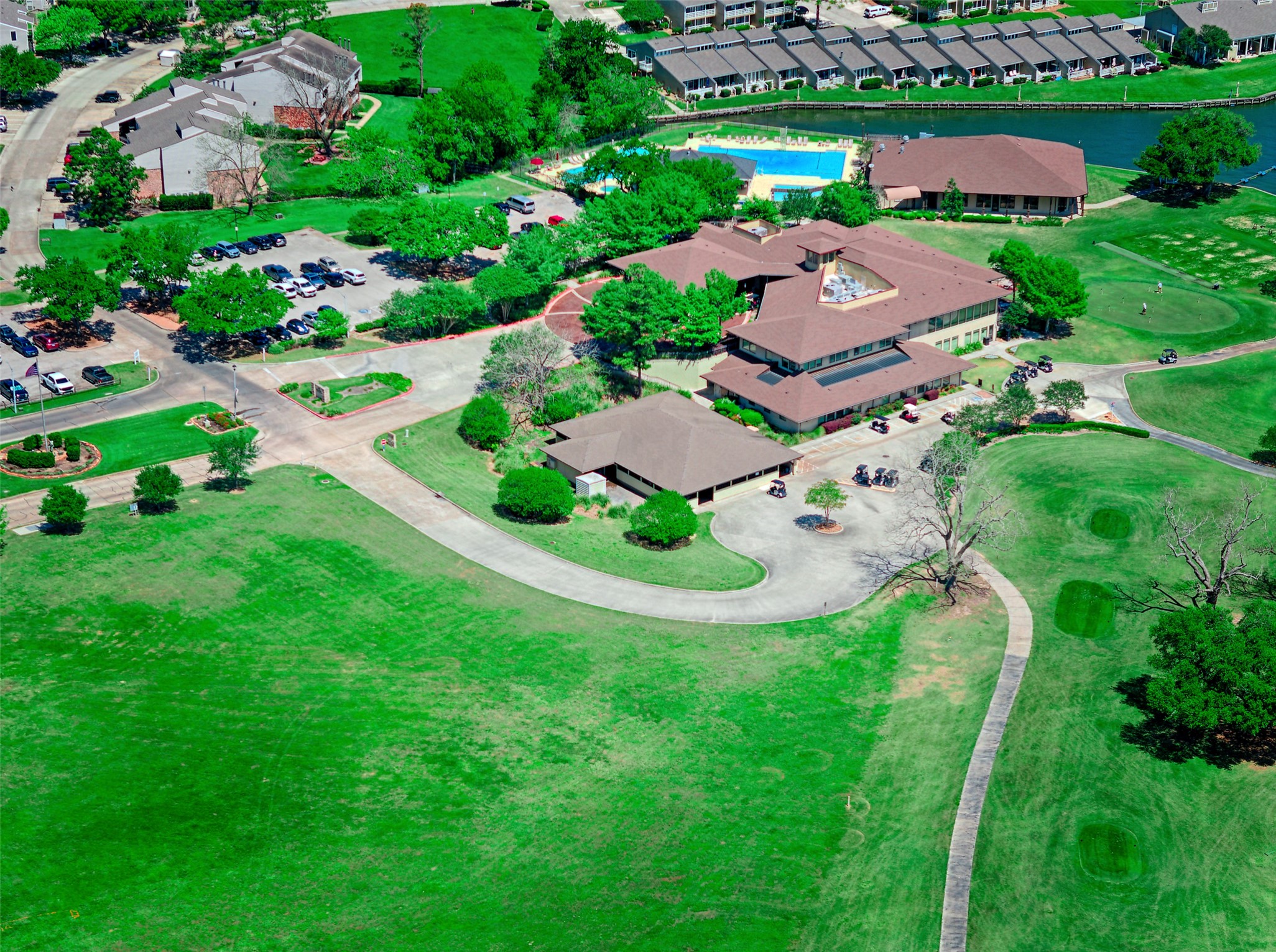 34 April Hill Conroe, TX 77356 - Photo 29 of 33 April Sound Country Club with neighborhood pool and tennis.
