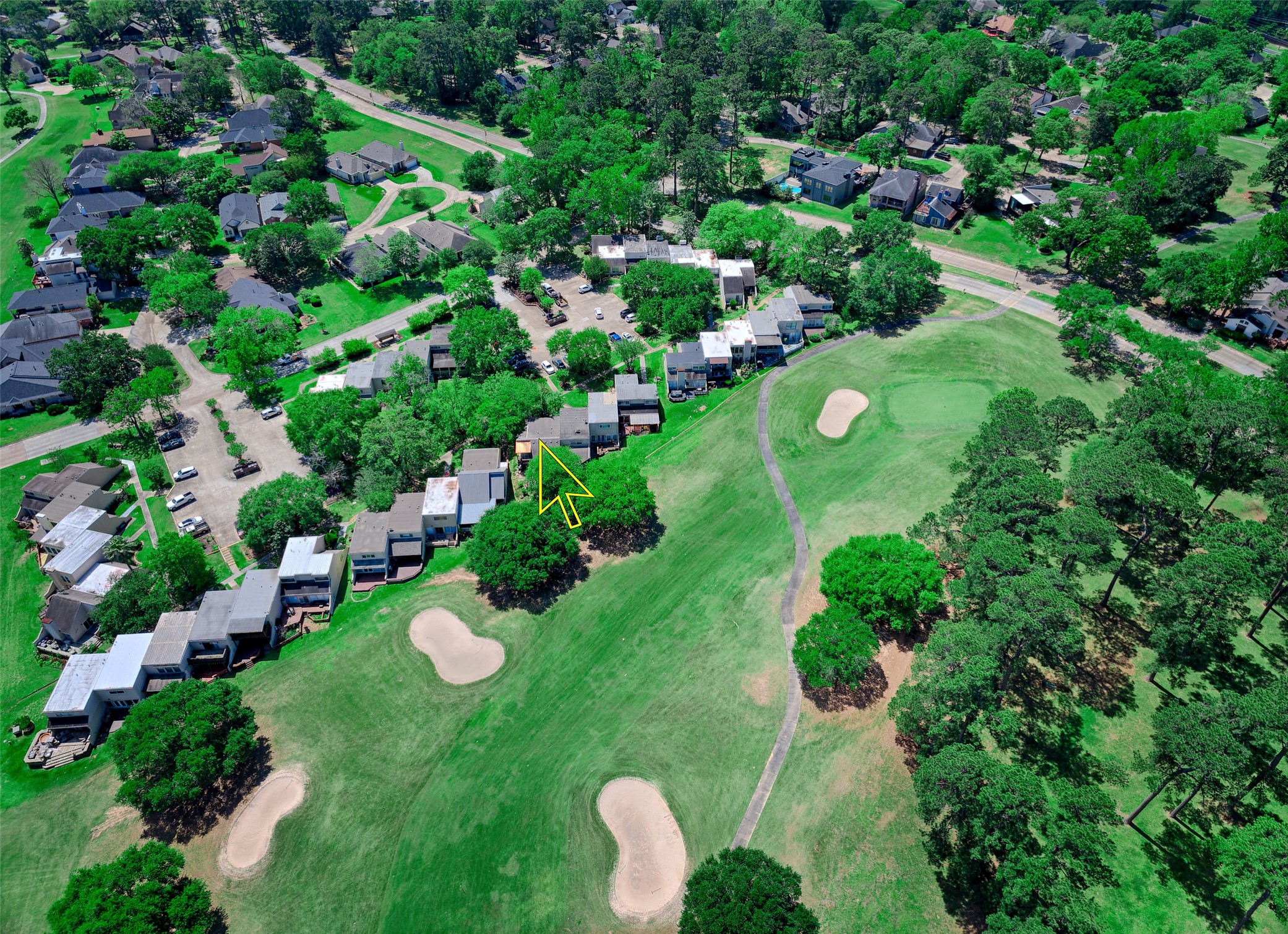 34 April Hill Conroe, TX 77356 - Photo 4 of 33 Aerial shot showing the home located on the first fairway of the April Sound golf course.