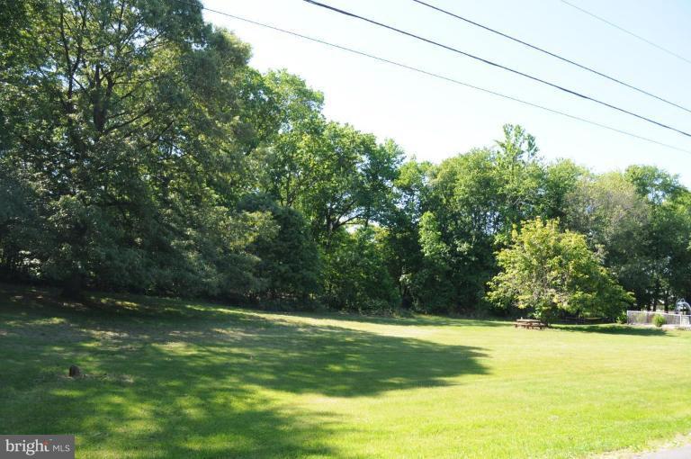 Telegraph Road Severn, MD 21144 - Photo 1 of 3 a backyard of a house with lots of green space