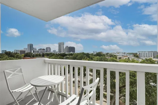 a view of a chairs and table on the terrace