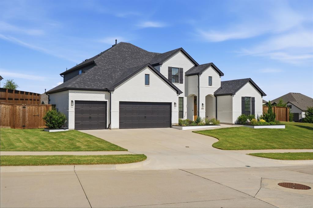 4202 Crown Run Road Midlothian, TX 76065 - Photo 31 of 34 Contemporary white brick exterior with dark trim accents