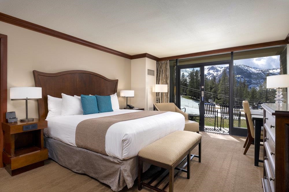 400 Resort Road, Unit 102104106 Olympic Valley, CA 96146 - Photo 15 of 27 a bedroom with a bed and a large window