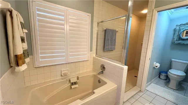 a bathroom with a tub and a sink