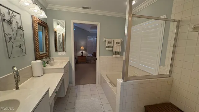 a bathroom with a sink and mirror
