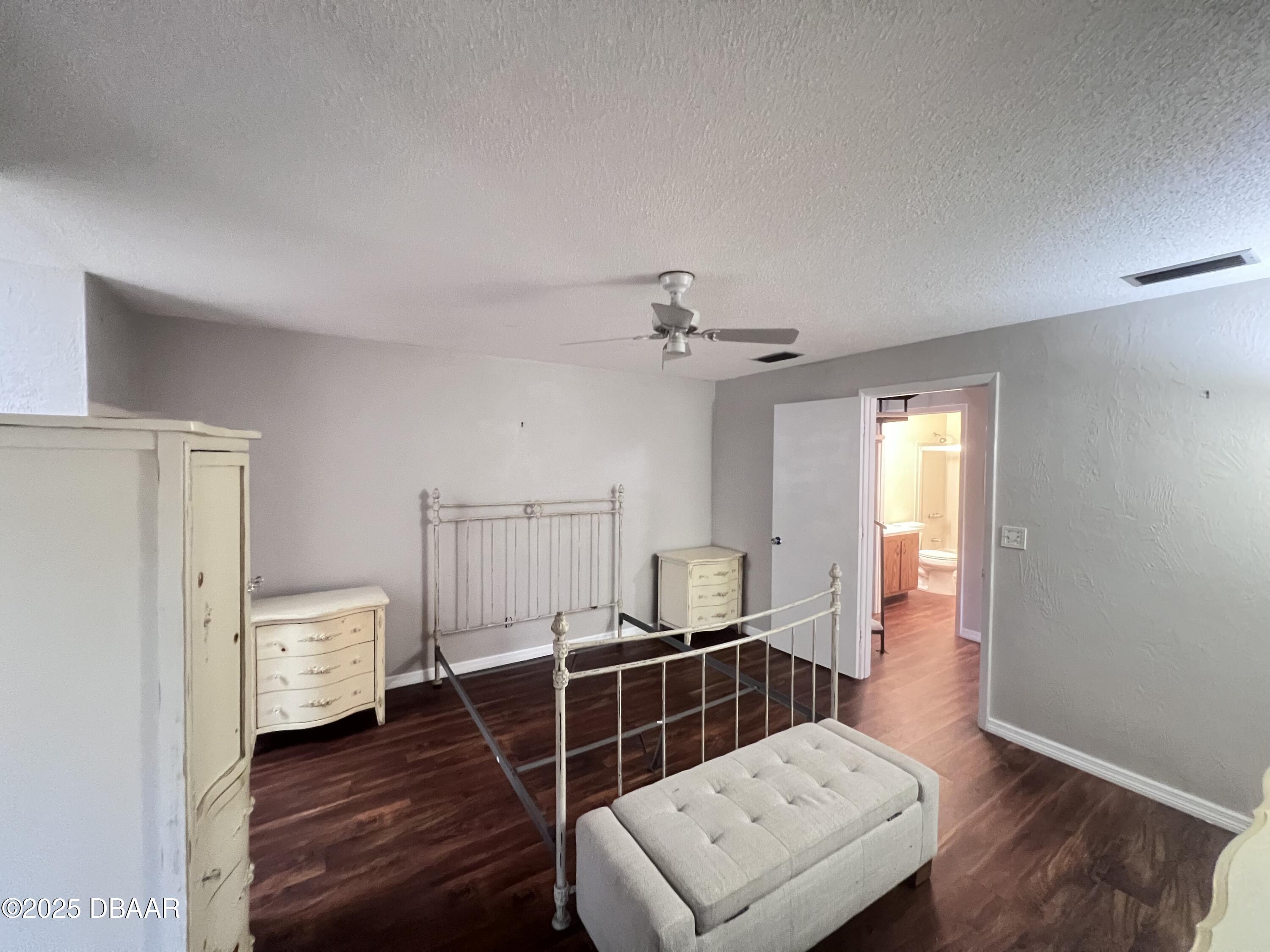80 Cypress Pond Road Port Orange, FL 32128 - Photo 12 of 31 a living room with furniture and a wooden floor