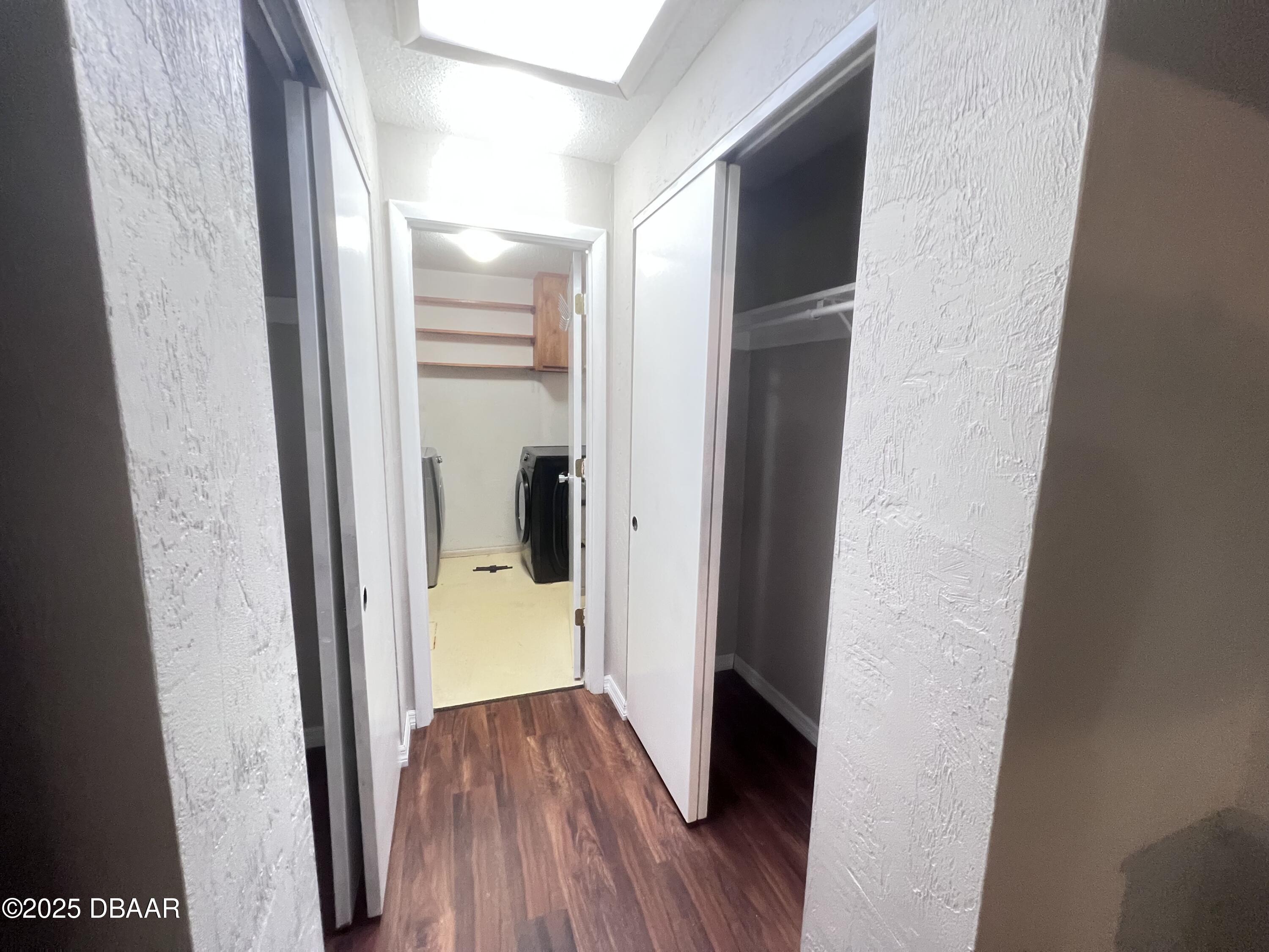 80 Cypress Pond Road Port Orange, FL 32128 - Photo 13 of 31 a view of a hallway with wooden floor