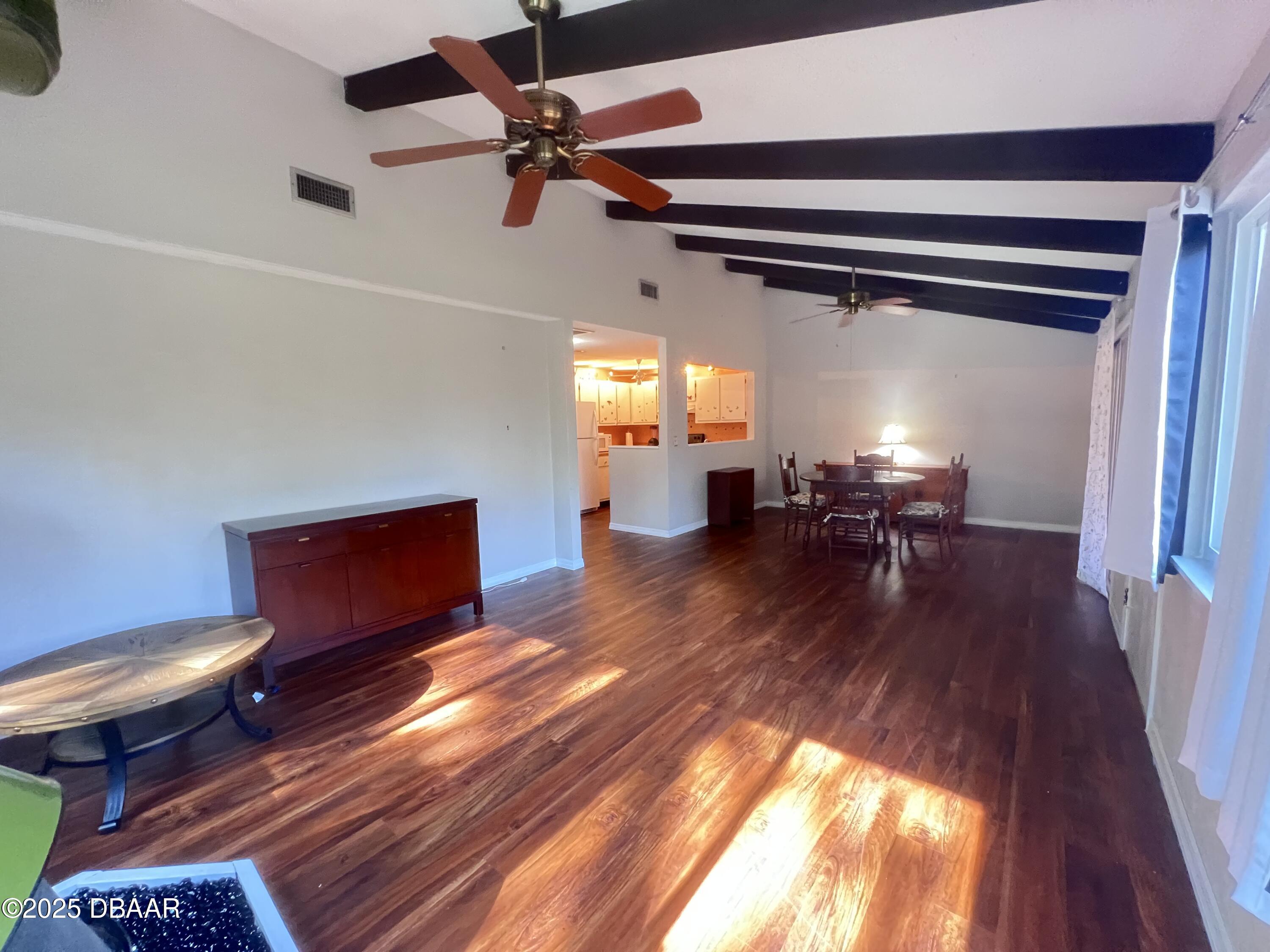 80 Cypress Pond Road Port Orange, FL 32128 - Photo 4 of 31 a view of a living room and a wooden floor