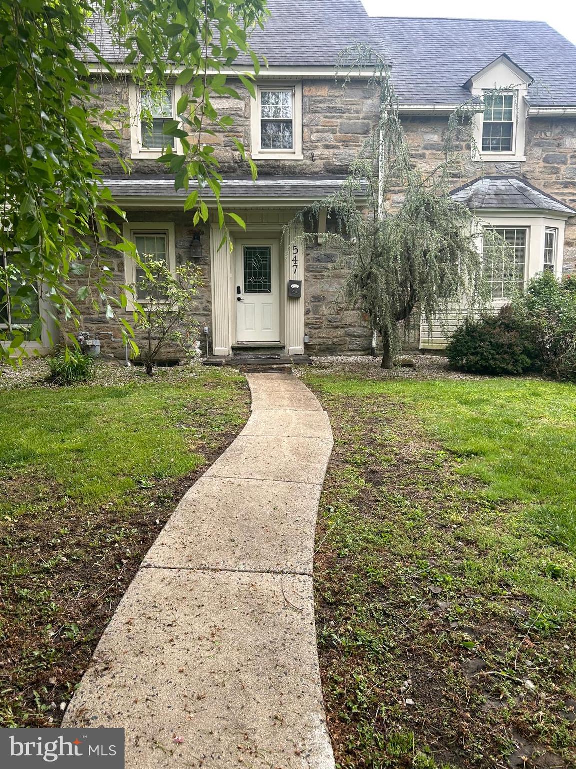 547 Baeder Road Jenkintown, PA 19046 - Photo 3 of 13 a front view of a house with garden