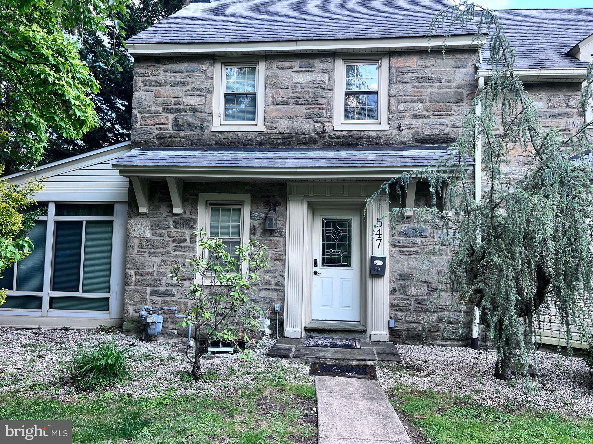 547 Baeder Road Jenkintown, PA 19046 - Photo 8 of 13 a front view of a house with garden