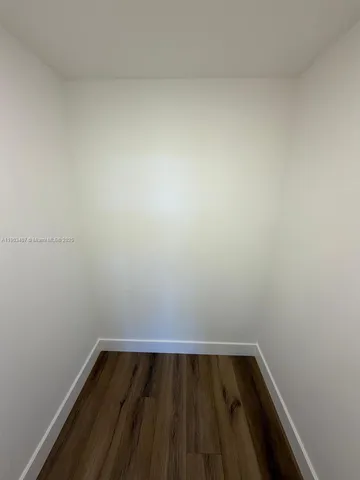 a view of a balcony with an ocean view