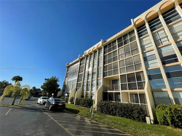a car parked in front of a house