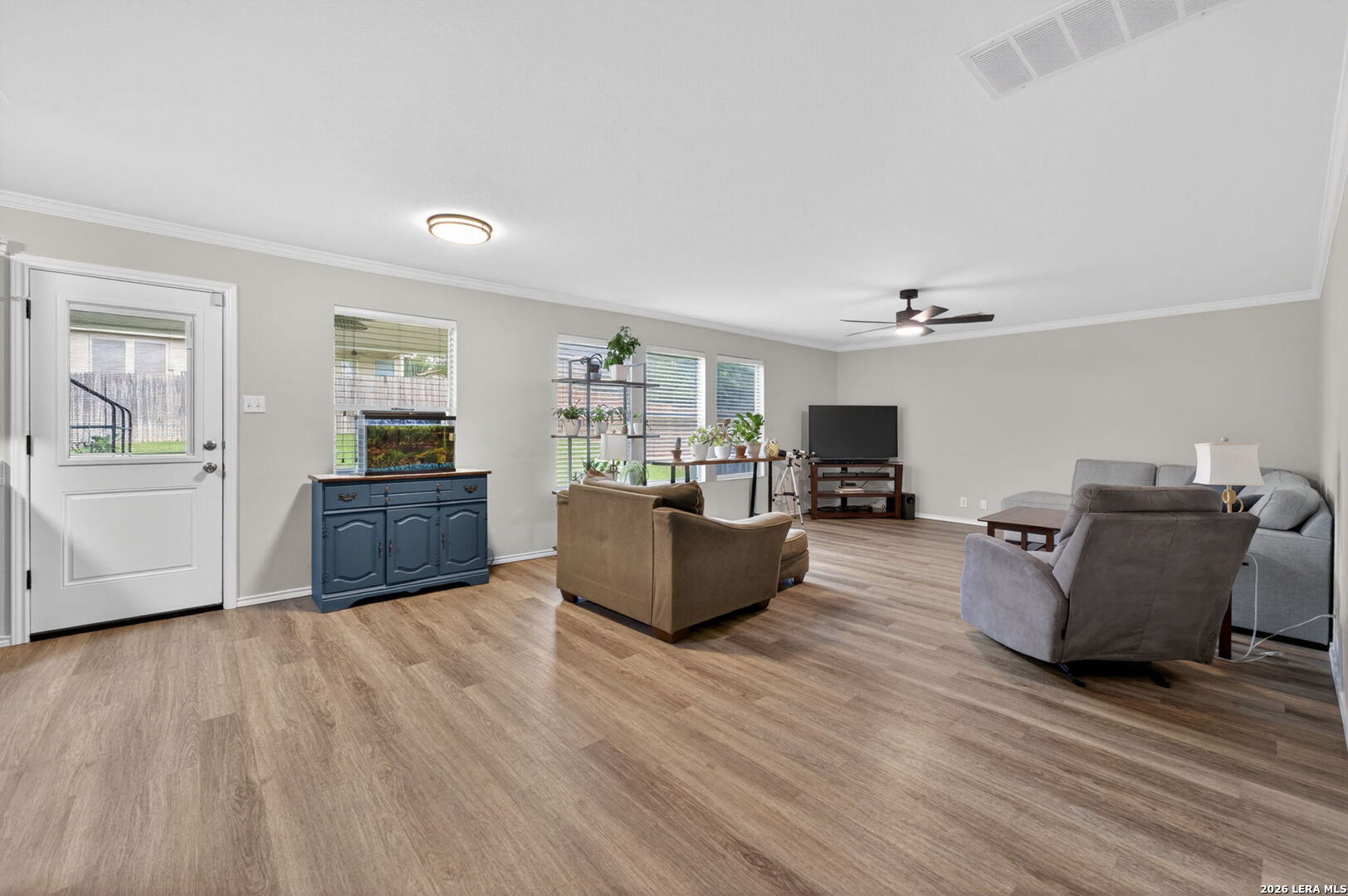 217 Willow Run Cibolo, TX 78108 - Photo 12 of 41 a living room with furniture and kitchen view
