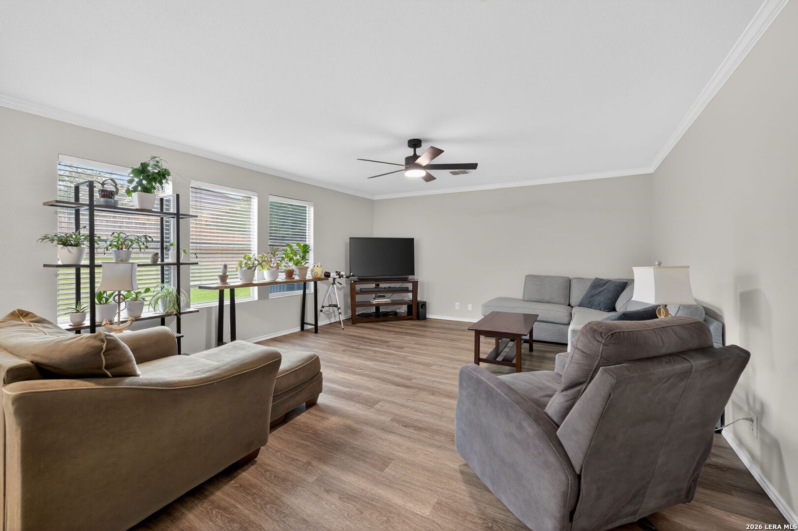 217 Willow Run Cibolo, TX 78108 - Photo 13 of 41 a living room with furniture and a flat screen tv