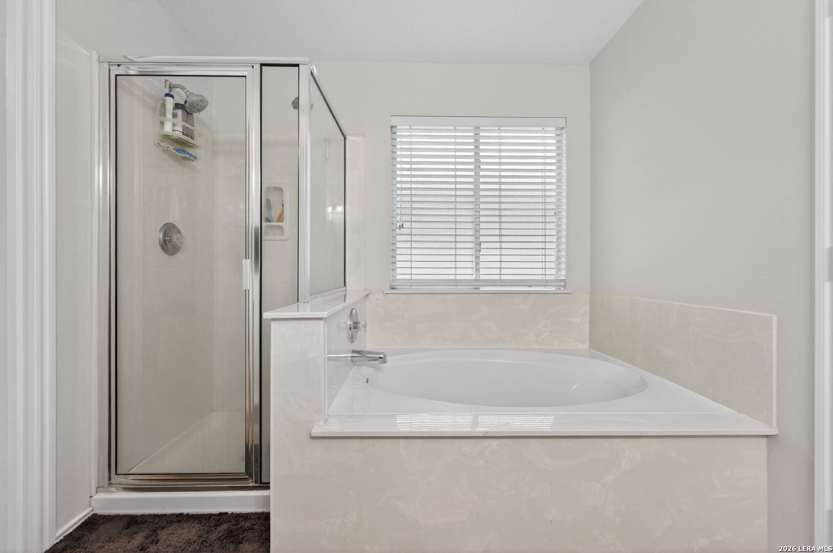 217 Willow Run Cibolo, TX 78108 - Photo 28 of 41 a white bath tub sitting next to a shower