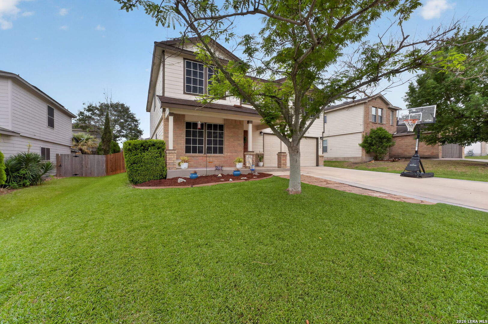 217 Willow Run Cibolo, TX 78108 - Photo 3 of 41 a front view of house with yard and green space