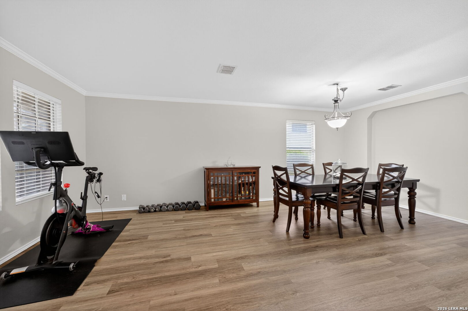 217 Willow Run Cibolo, TX 78108 - Photo 8 of 41 a view of a dining room with furniture and wooden floor