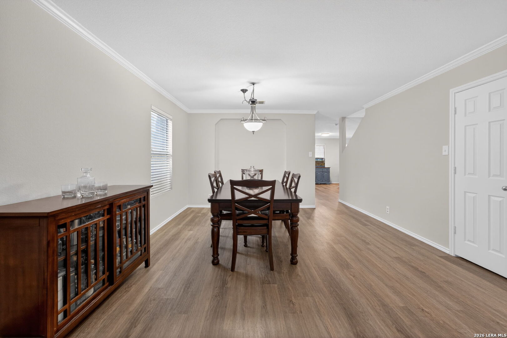 217 Willow Run Cibolo, TX 78108 - Photo 9 of 41 a view of a dining room with furniture and wooden floor