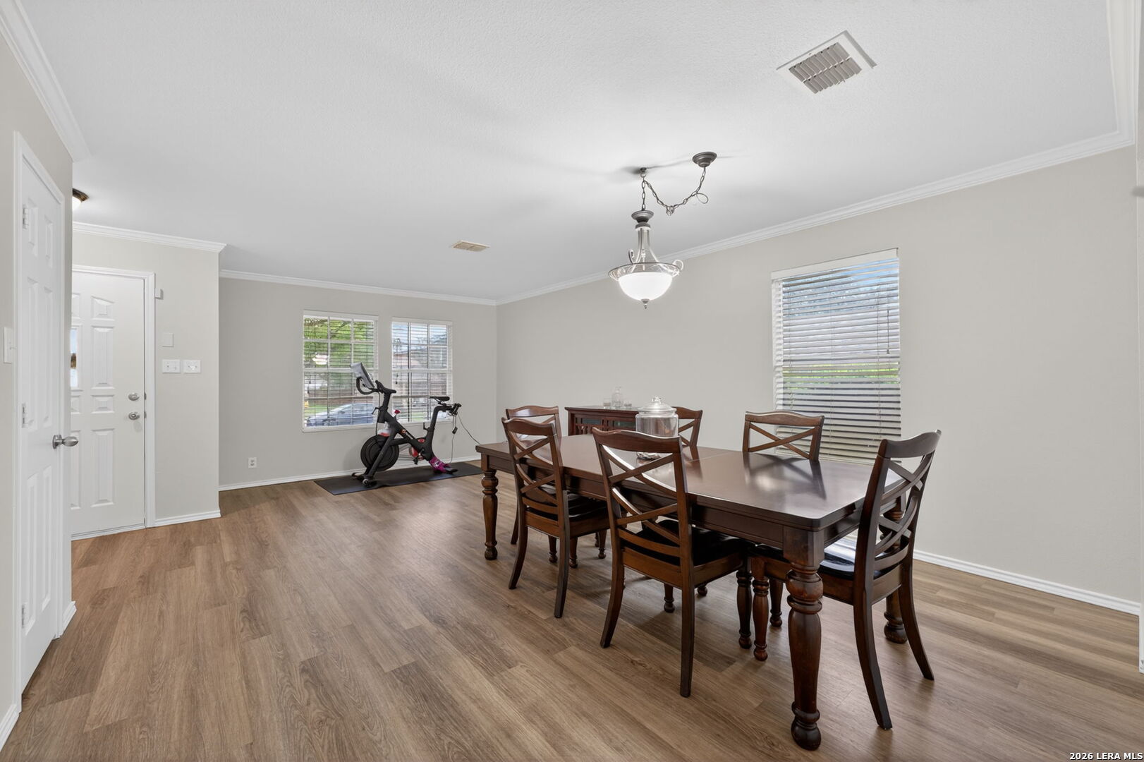 217 Willow Run Cibolo, TX 78108 - Photo 10 of 41 a view of a dining room with furniture and wooden floor